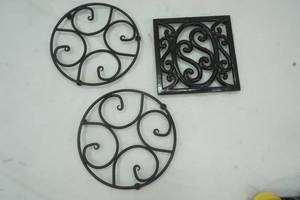 lot 145 image: Three Black Trivets 2 Circle and 1 Square