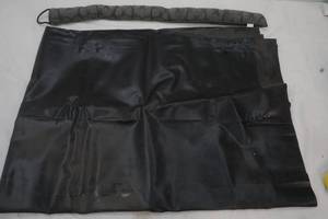 lot 150 image: Heavy Duty Black Plastic (size and length Unknown) and a door draft blocker