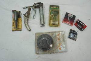 lot 177 image: Remington Powder Actuated Tool, ear plugs, nails, and 22 caliber