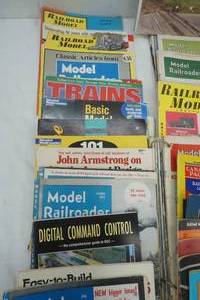 lot 184 image: Variety of Vintage Model Railroader Magazines, Picture of a Train, and other magazines on Electrical Trains and RailRoads