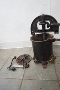 lot 208 image: Vintage Cast Iron Sausage Stuffer