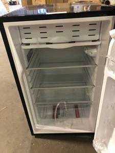 Magic Chef 4.4 cu. ft. Mini Fridge in Black Damaged  Customer Returns See Pictures