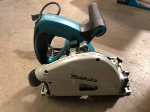 lot 13 image: Makita 12 Amp 6-12 in. Plunge Circular Saw Customer Returns See Picture