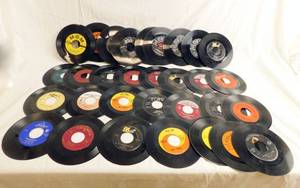 lot 56 image: Lot of 31 Vintage 45 RPM Records Including Buck Owens My Heart Skips A Beat