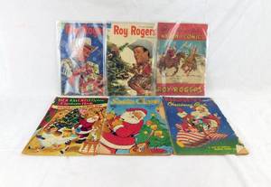 lot 22 image: Lot of 6 Vintage 1940s and 1950s Christmas Comic Books including Roy Rogers and more