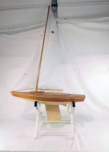 lot 9 image: Star Class Sailboat by Dumas with Stand