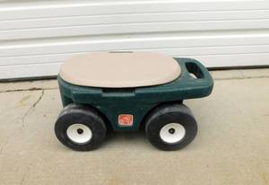 lot 73 image: Step 2 Multi Purpose Rolling Garden Hopper Utility Seat Storage Cart
