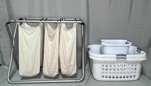 lot 28 image: 3 Bag Laundry Hamper & Baskets