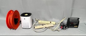 lot 53 image: Lot of Extension Cords, Fan, Schumacher Automobile Battery Charger