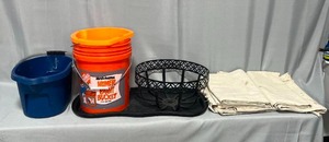 lot 55 image: Lot of Paint Buckets, Paint Canvas Drops, Metal Plant Holder, Shoe Mat