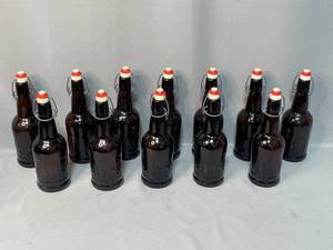 lot 79 image: Lot of 12 VTG Amber Brown Empty Beer Bottles