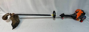 lot 113 image: Remington Quick Start Weed Whip Model RM2560