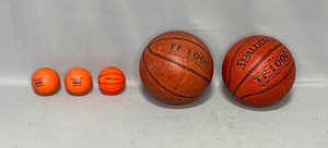 lot 137 image: Two Spalding Basketballs with 3 Mini Basketballs