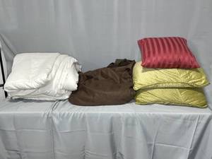 lot 160 image: 3 Pillows with Brown Comforter