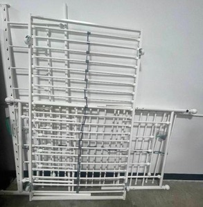 lot 194 image: Unassembled White Iron Day Bed - hardware not verified