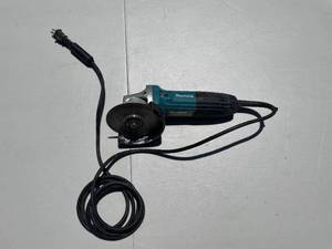 lot 10 image: Makita Corded Angle Grinder with Hard Case
