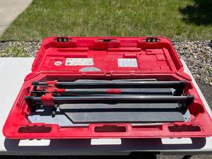 lot 18 image: Rubi TX-700-N Tile Cutter in Red Carrying Case