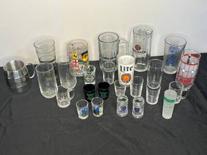 lot 84 image: Large Variety of Collectible Beer Mugs and Glasses and Large Selection of Shot Glasses