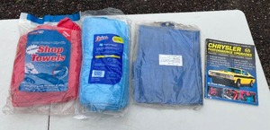 lot 36 image: Lot of Cleaning Towels, Poly Tarp, and Car Performance Guide