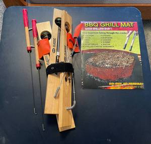 lot 174 image: Lot of Fire Wire BBQ Skewers and BBQ Grill Mat