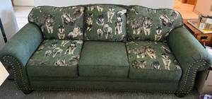 lot 90 image: Different Animal (Wolves) Themed Couch & Wing Back Chair, Ottoman & Pillows