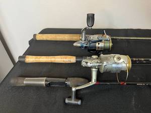 lot 95 image: 3 Fishing Rods w (1) Shakespeare & (1) Presidential Reels
