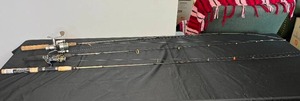 lot 96 image: 3 Fishing Rods w (1) Presidential & (1) Axiom Reels