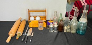 lot 100 image: Lot of Antique Kitchenware Inc PepsiRoot Beer Bottles, S&P Dispenser, Rolling Pins, Knives, Ball Jars, ETC