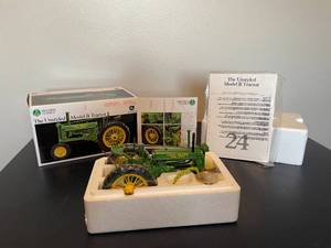 lot 200 image: John Deere The Unstyled Model B Tractor Replica with Collectors Coin