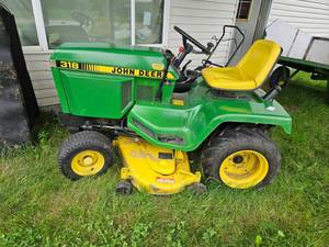 lot 1 image: John Deere 318 Garden Tractor with Mower Deck inc. Side Shields