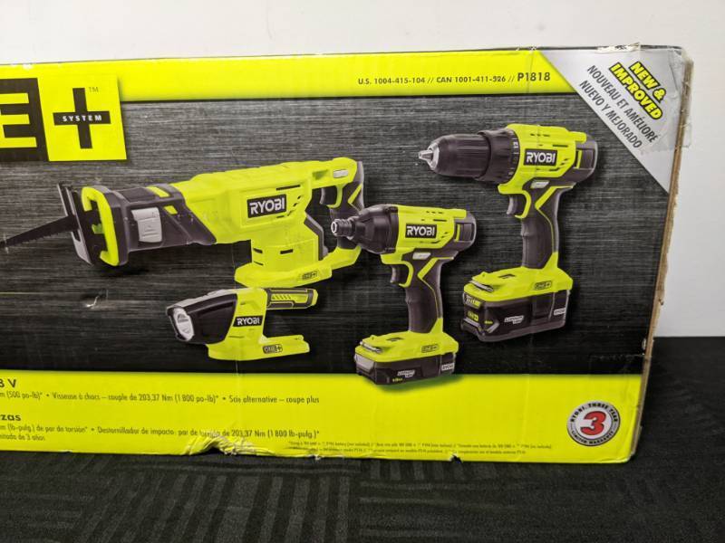 lot 18A image: Brand New RYOBI 18V ONE Cordless 12in. DrillDriver, Impact Driver, Reciprocating Saw, and Work Light Kit with Batteries and Charger $219 Retail N