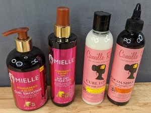 lot 72F image: New Mielle Organics Pomegranate & Honey Curl Smoothie & Air Dry Styler Gel Camille Rose Naturals Moisture Milk, Rice Milk & Macadamia Oil, Curl Love Camille Rose Ultimate Growth Serum, Cocoa Nibs & Honey Package Retail $55.20 I