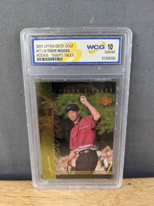 lot 36G image: Tiger Woods 2001 Upper Deck Golf WCG Graded 10 Rookie Tigers Tales Card #TT18 V