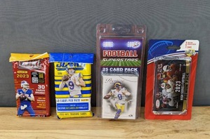 lot 39E image: Lot of 4 Brand New Factory Sealed NFL Trading Card Sets 2023 Panini Score, 2022 Panini Score, 3Bros and A Card Store Prestige Football Superstars, 2023 High Series Football Premium Pack I