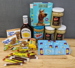 lot 105B image: Sweet Baby Rays Barbeque Sauce, Skippy Peanut Butter, Dunkaroos, Scoob Fruit Snacks, Belvita Crunchy, Little Bites, Slim Jims and Frenchs Stone Ground Dijon Mustard N