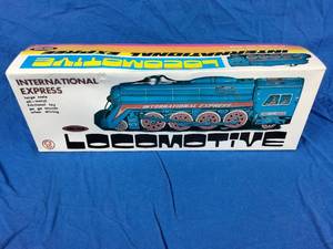 lot 50 image: International Express Locomotive Tin Toy