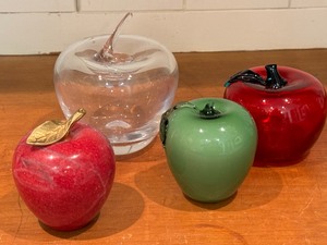lot 45 image: Four Art Glass and Marble Apple Paperweights