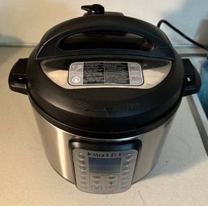 lot 88 image: Instant Pot Electric Pressure Cooker