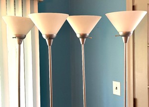 lot 118 image: Four Silver Floor Lamps