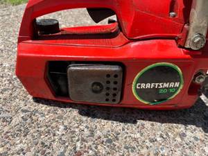 lot 185 image: Craftsman 2.0 Ten Inch Chainsaw Model 358. 352030