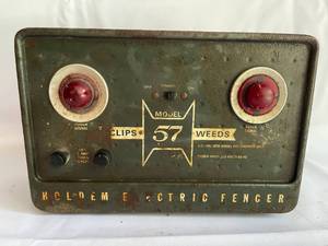 lot 211 image: Vintage Hol-Dem Electric Fencer Deco Piece