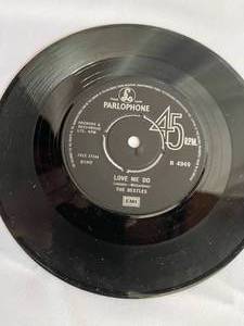 lot 246 image: Beatles Love Me Do 45  in the Original Sleeve