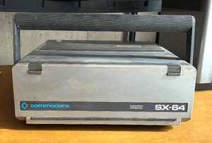 lot 247 image: Vintage Commodore SX-64 Computer