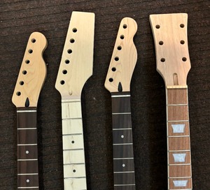 lot 95 image: Four Guitar Necks