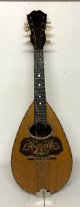 lot 115 image: Mandolin by Eugene Howard