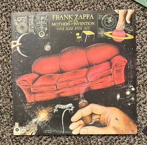 lot 15A image: 4 Frank Zappa Record Albums including Sleep Dirt, 200 Motels, Apostrophe and One Size Fits All.