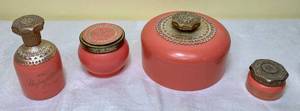 lot 16 image: Vintage Avon Unforgetable Collection - Beauty Dust, Cologne Mist, Cream Sachet (Empty) and Perfumed Skin Softener (Empty)