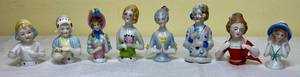 lot 27 image: Antique Porcelain Half Doll Pin Cushion Tops - 8 pieces - 2.5 H
