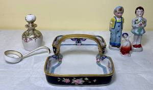 lot 32 image: Occupied Japan and Nippon Hand Painted Porcelain Pieces - Antique Nippon Ladle & Tray plus Occupied japan Wind Swept Lady and Boy & Girl Figurines