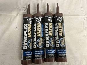 lot 146 image: 4 Bottles of Dap Synaflex Ultra Window, Door, Siding & Trim